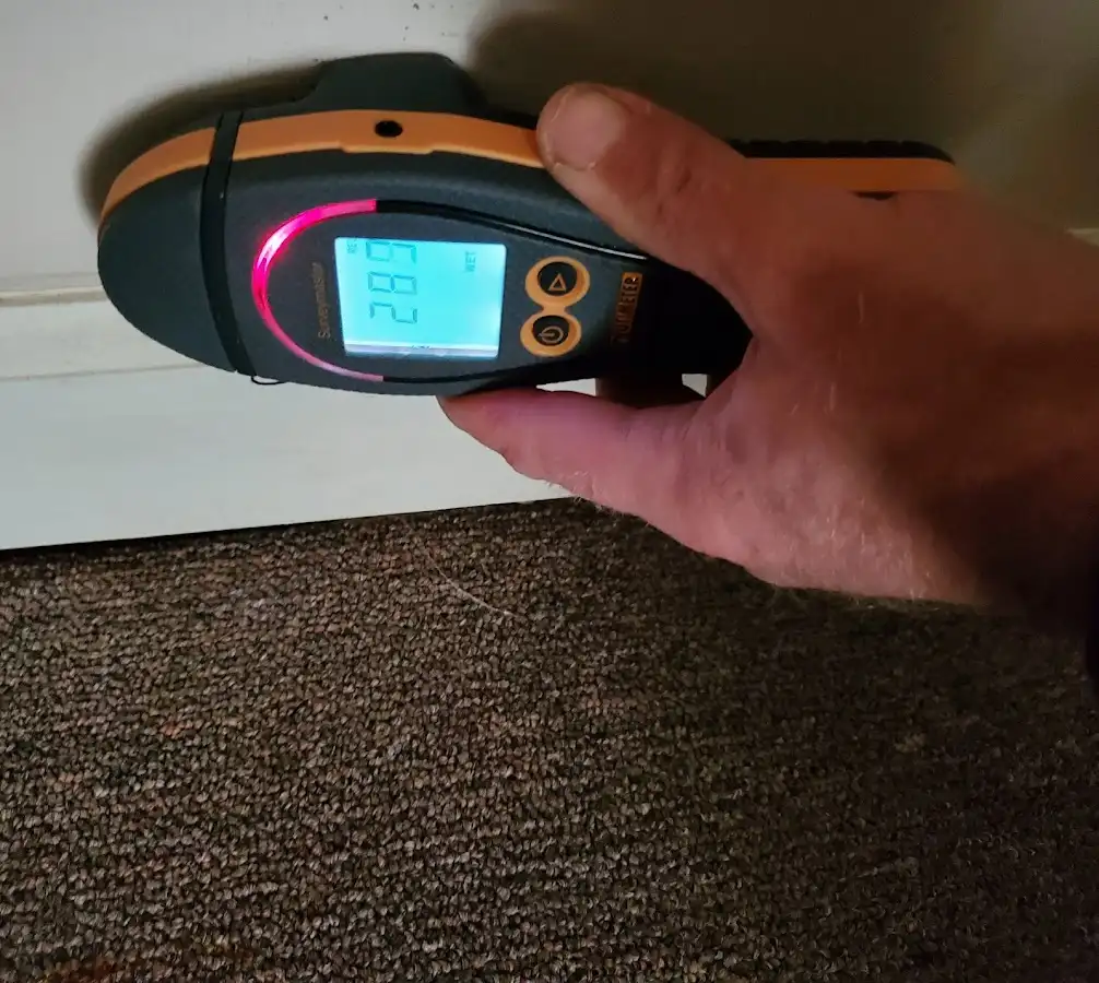 Moisture detection at baseboard during Burst Pipe Cleanup in Strongsville